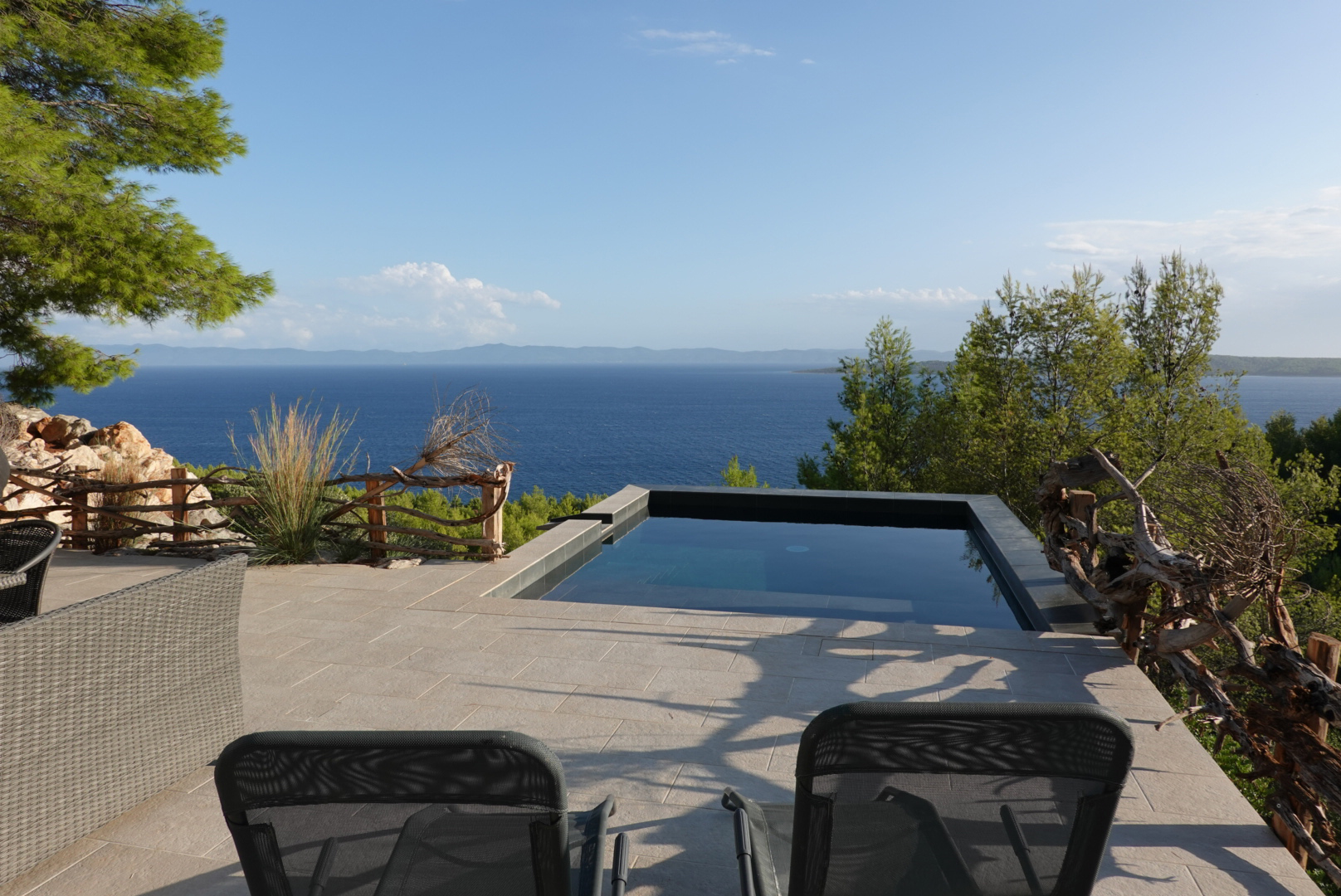 View over swimming pool towards the islands of Scedro and Korcula