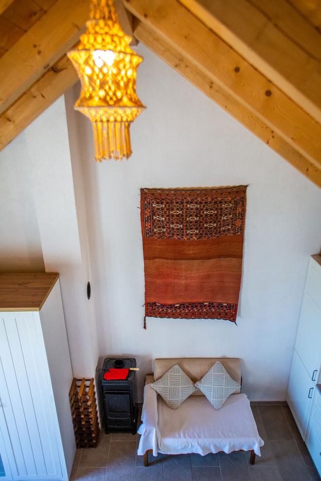 Looking down from the mezzanine into the living area.